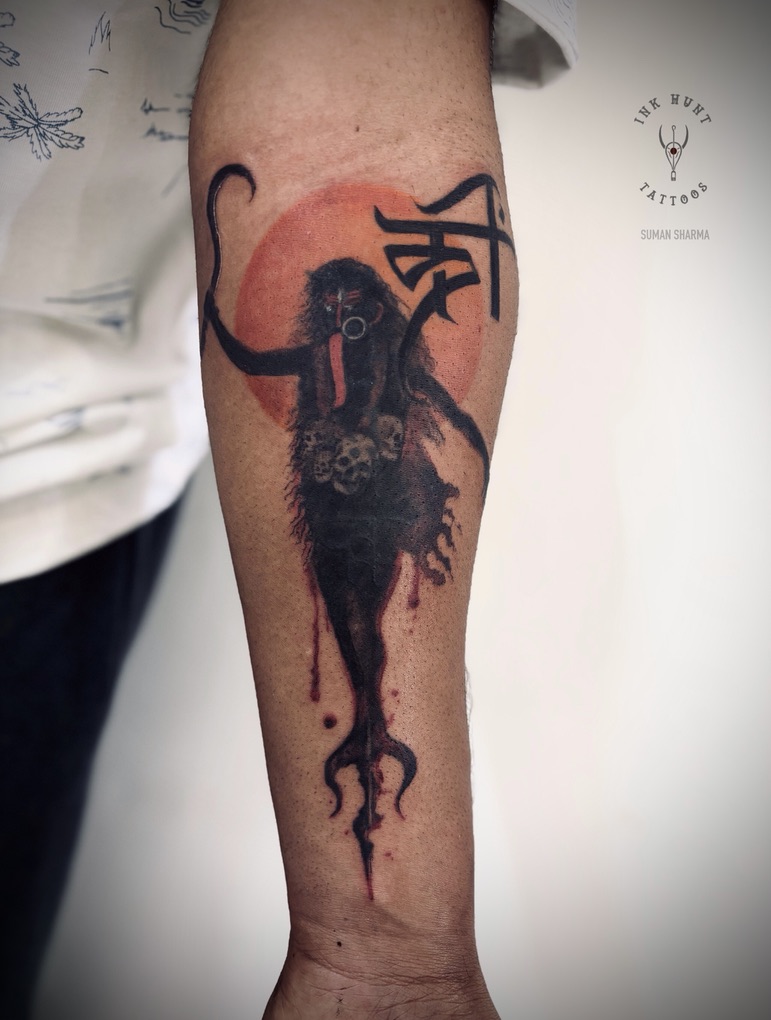 Abstract Hanuman and sun tattoo