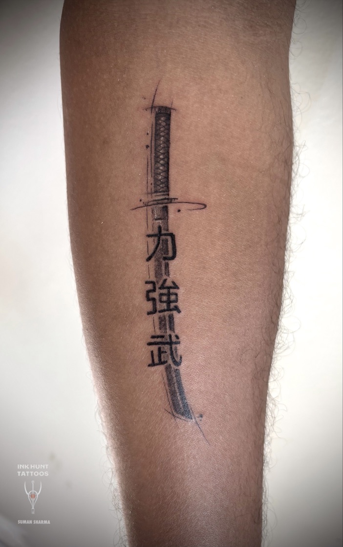 Fine-line samurai and kanji tattoo