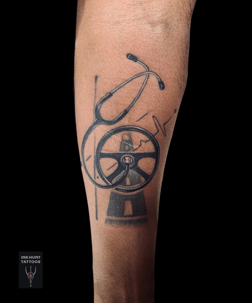 Lettering tattoo with heartbeat line